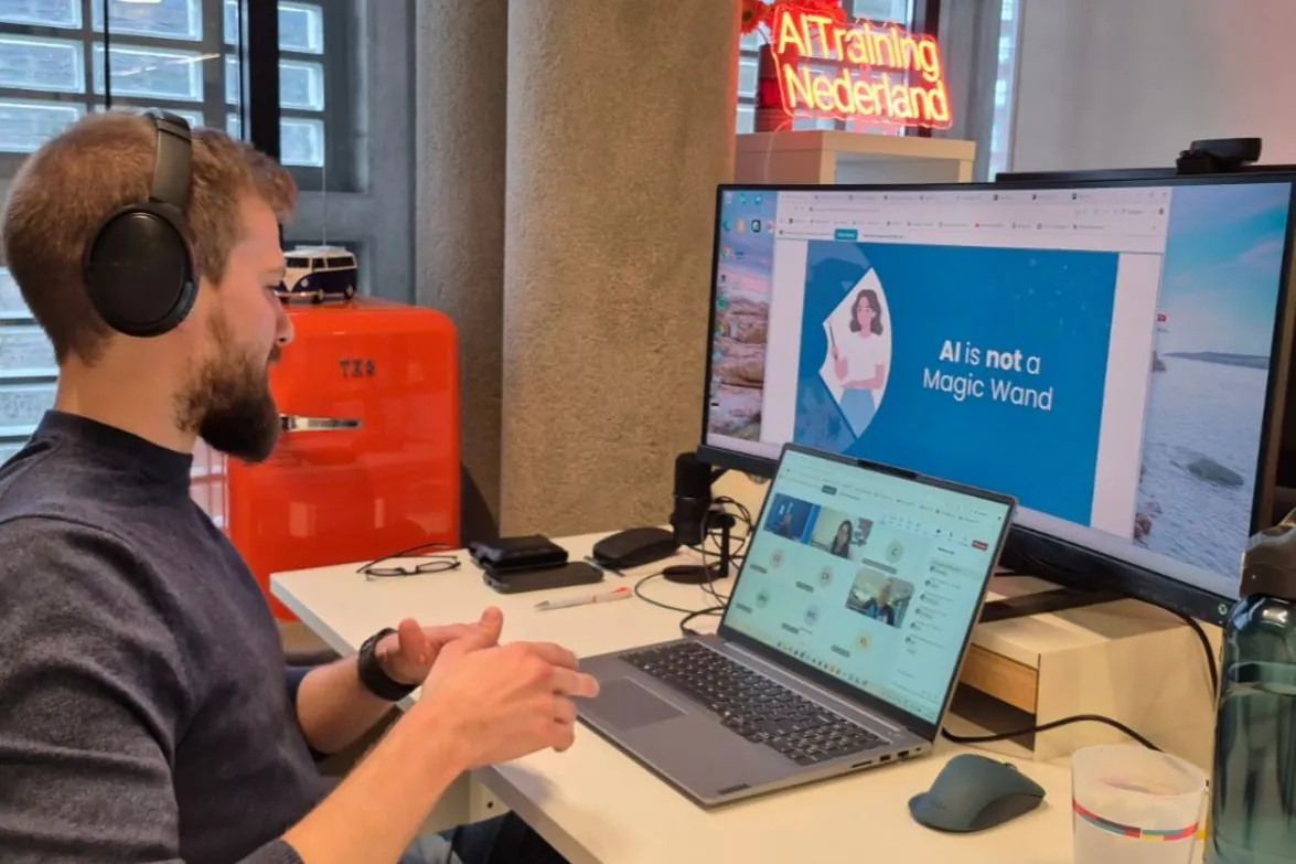 Jamie running an online AI training session, with a slide reading AI is not a magic wand